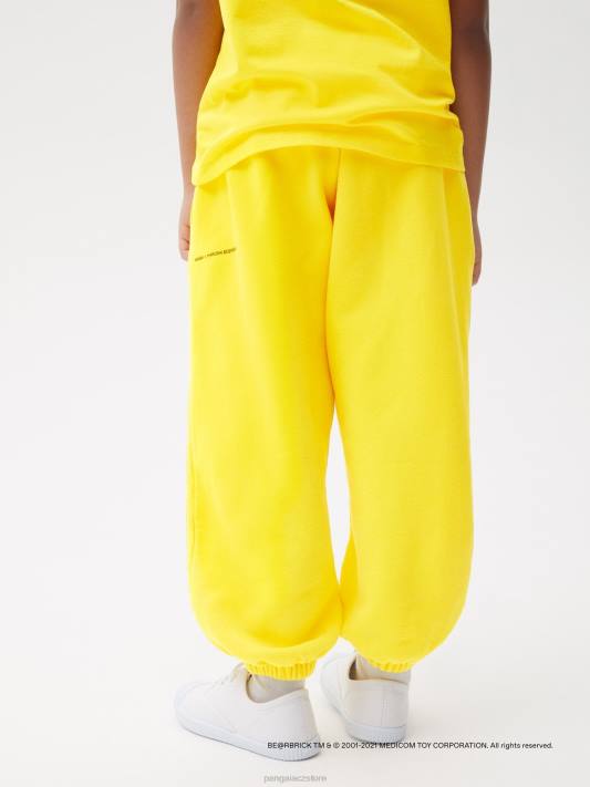 x tepláky haroshi be@rbrick R6FH645 šafránově žlutá oblečení Pangaia děti